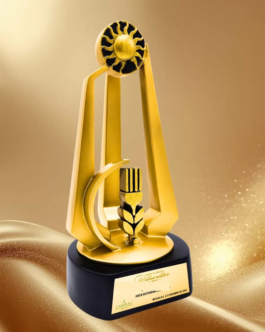 Premio al mérito restaurantero por Alpuerta